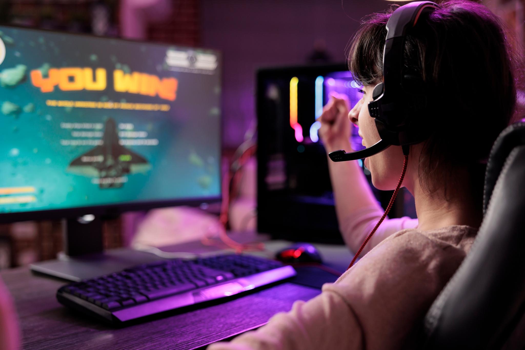 Computer gamer celebrating a win