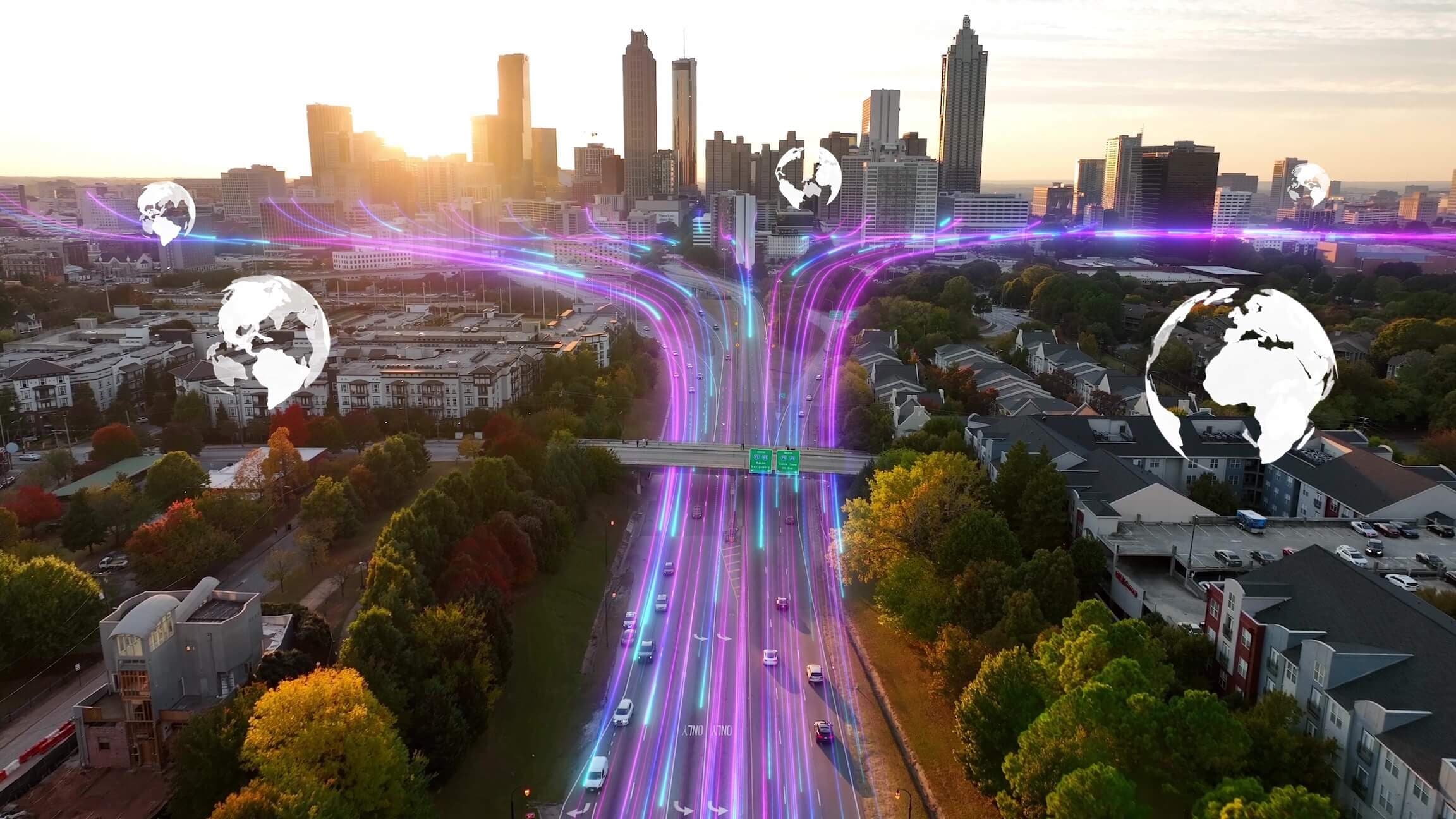 blog/Purple and blue fiber optic light streams travel over highway into a city.png