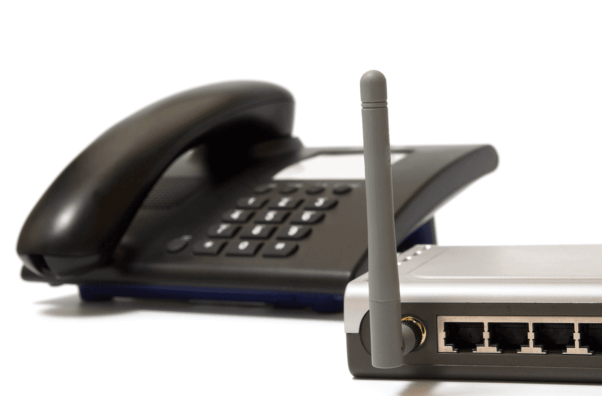 Landline phone next to internet router
