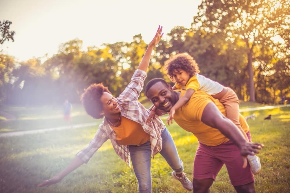 Happy urban family in park