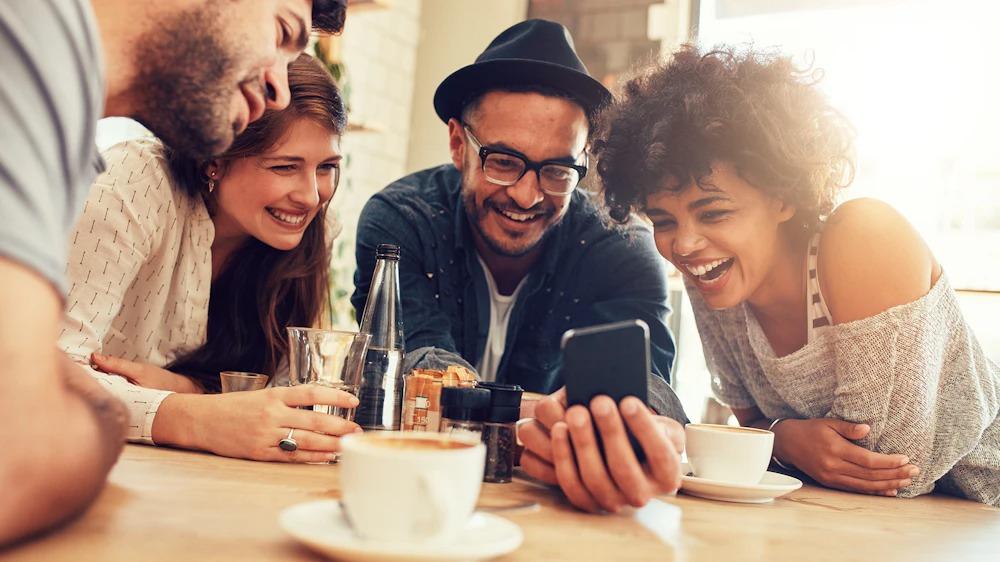 Friends use high speed internet to download videos using Kinetic internet