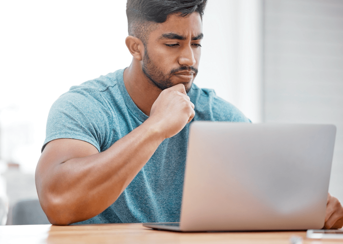 Man sits on computer|