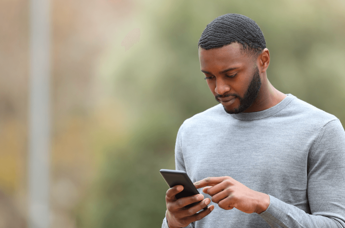 blog/Man taps smart phone screen.png