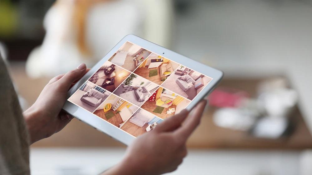 Close up of a wireless tablet displaying photos