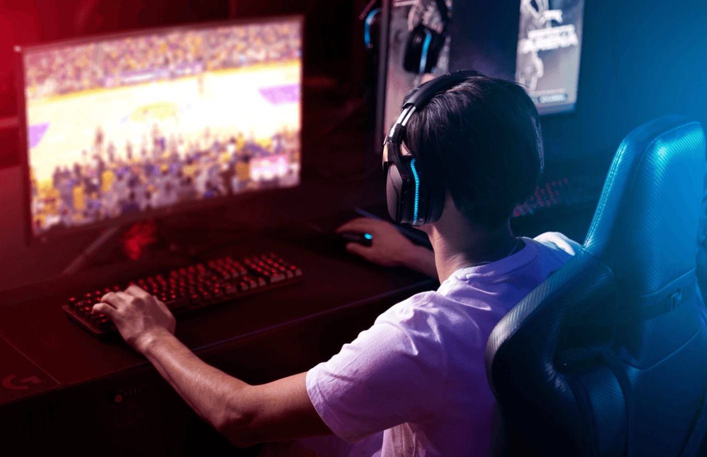 Gamer plays a sports game on his computer